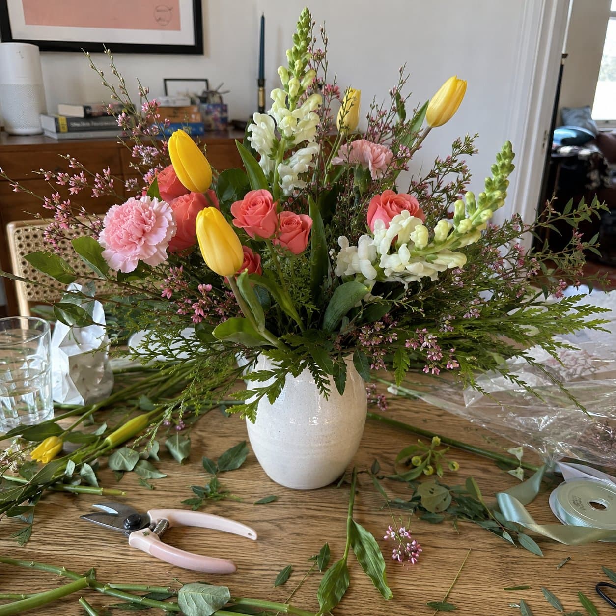 Unedited flower shop workbench photo before BloomShot